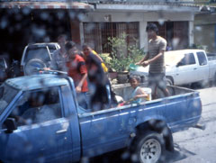 During Songkran, the Southeast Asian New Year, people cruise the street in pickup trucks loaded with kids throwing water.